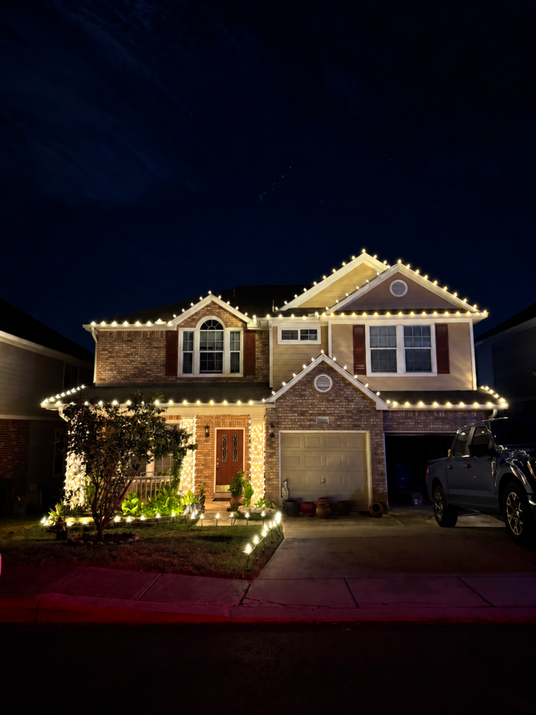 Completed Christmas lighting installation by Penguin Christmas Lights